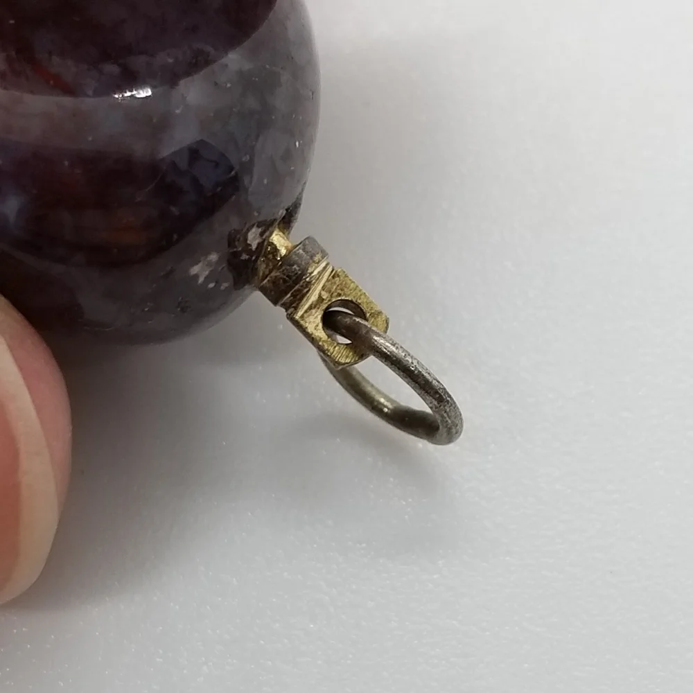 mottled purple stone pendant